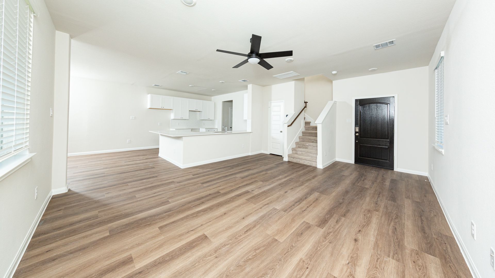 Family Room to Kitchen and Dining Area