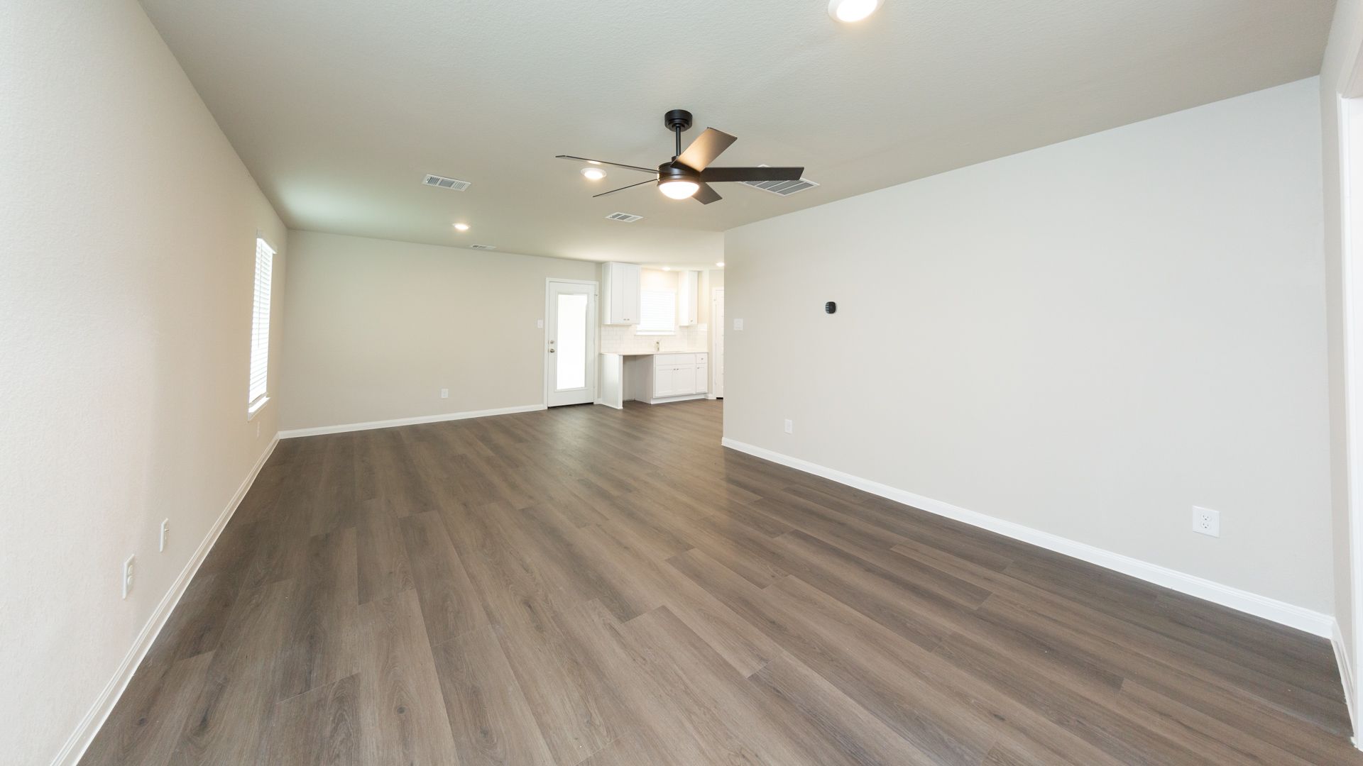 Family Room to Dining Area and Kitchen
