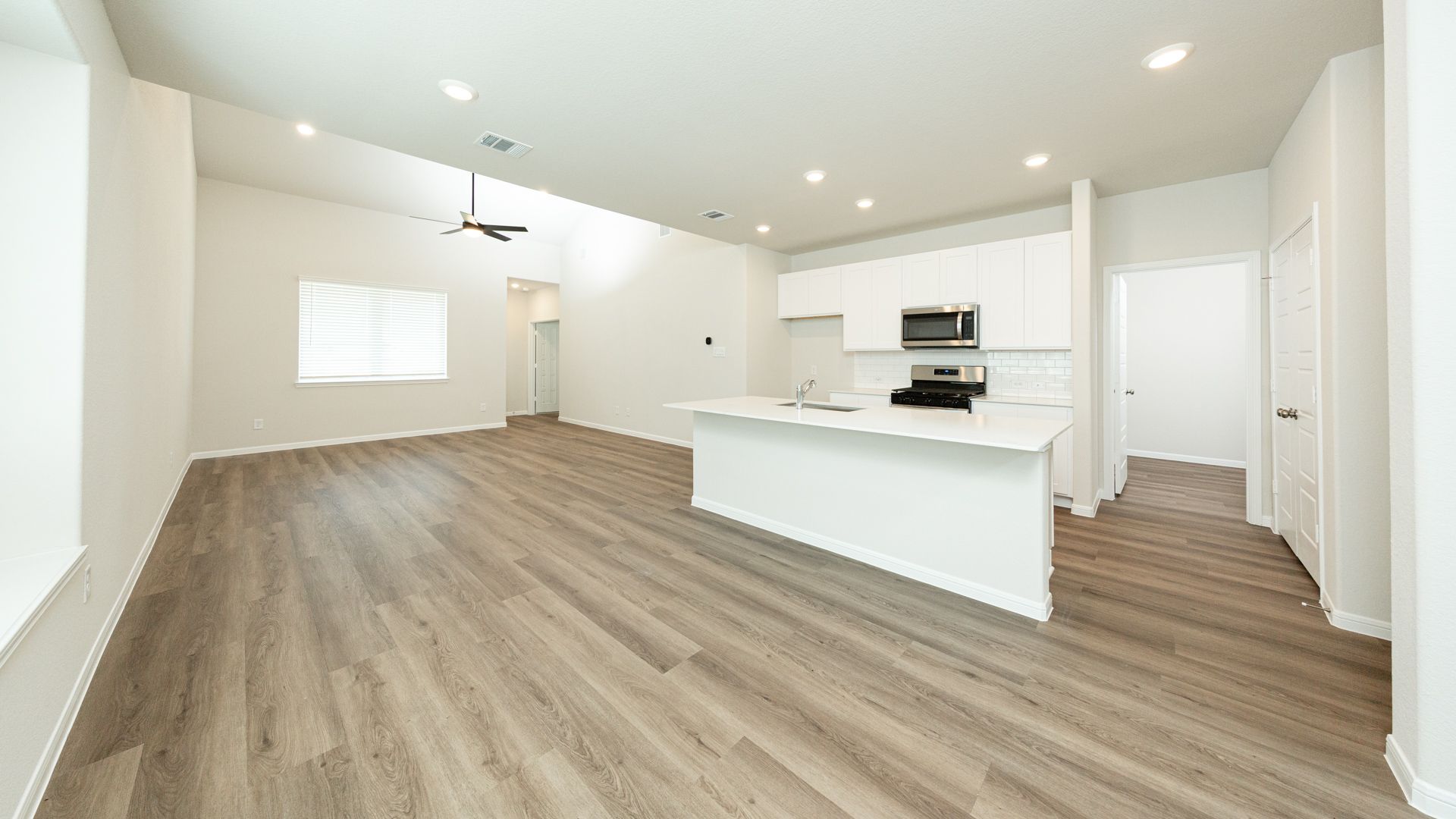Dining Area and Kitchen to Family Room
