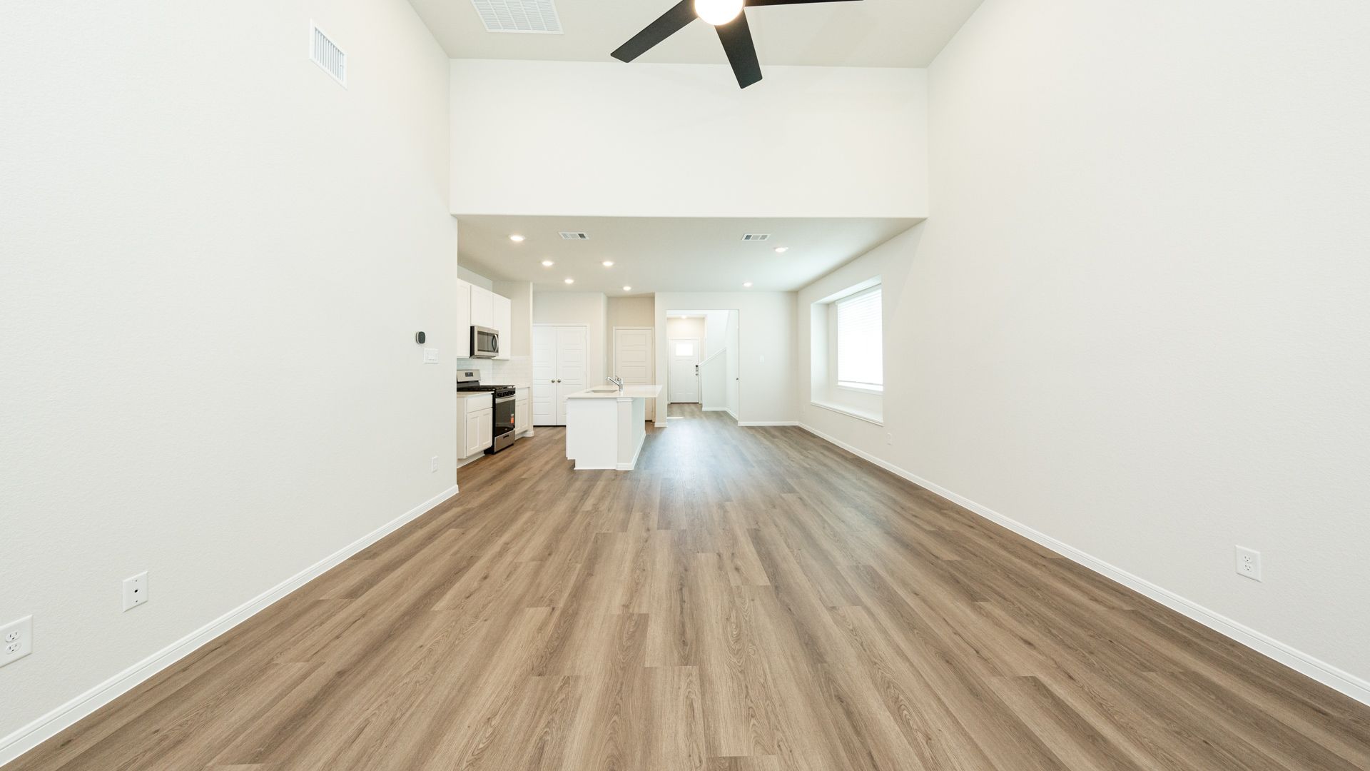 Family Room to Kitchen and Dining Area