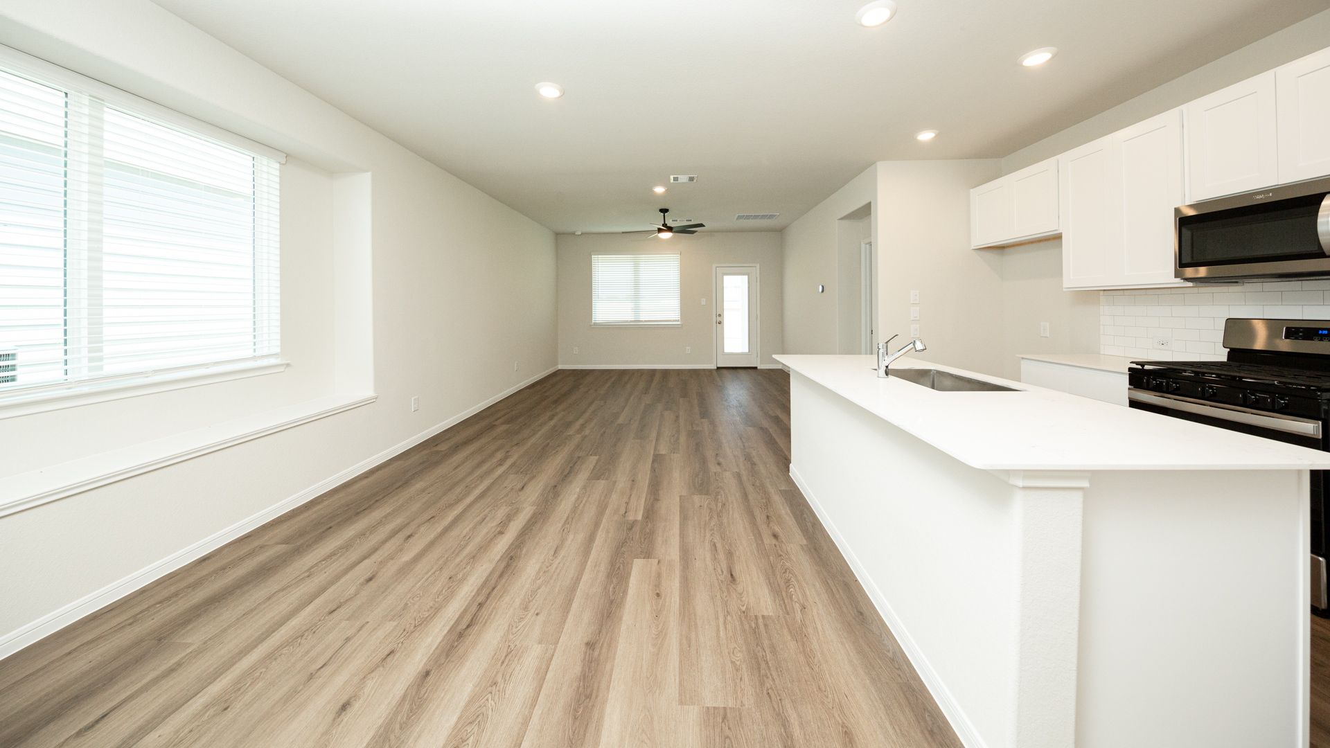 Kitchen to Dining Area and Family Room