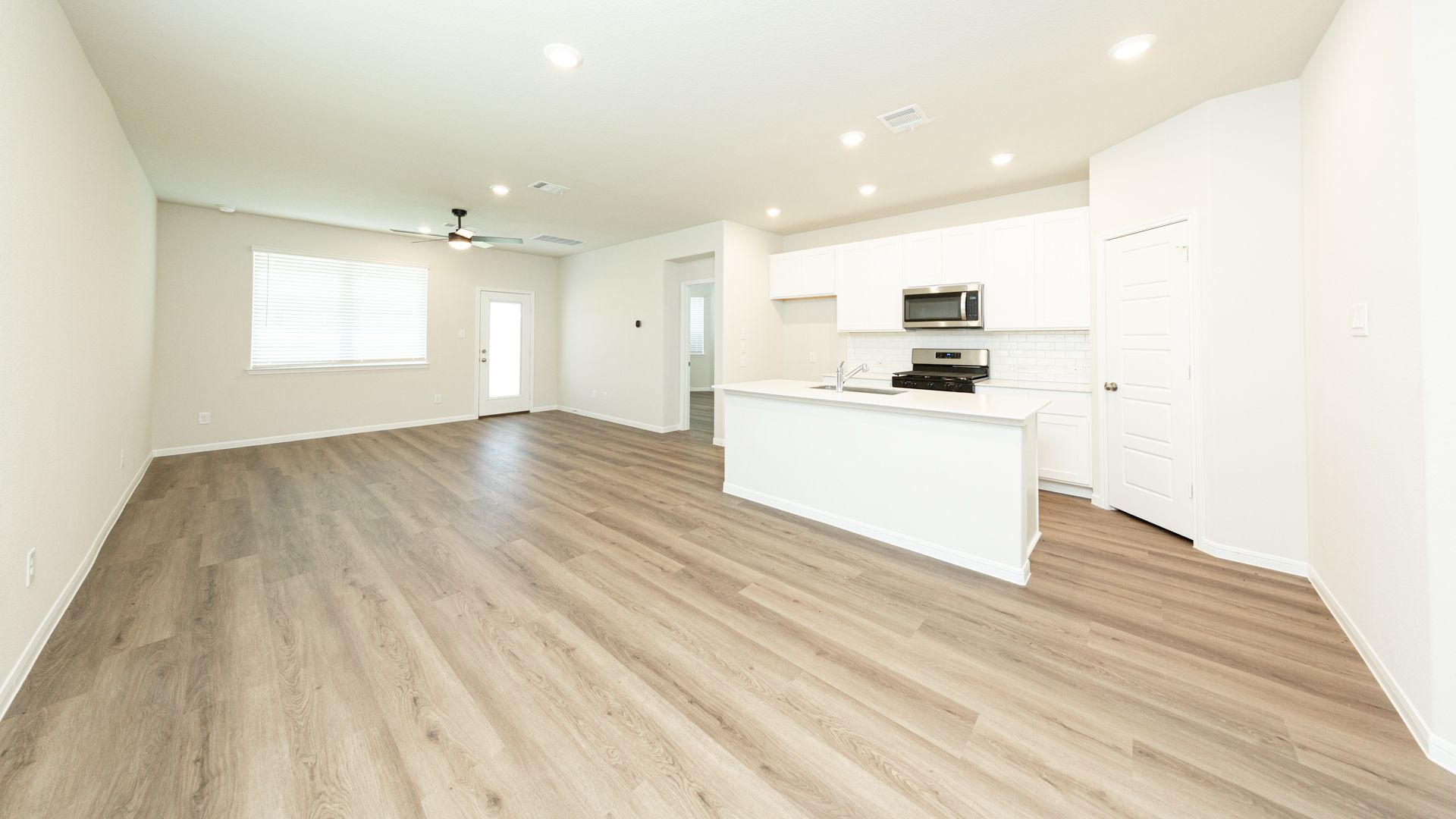 Kitchen to Dining Area and Family Room