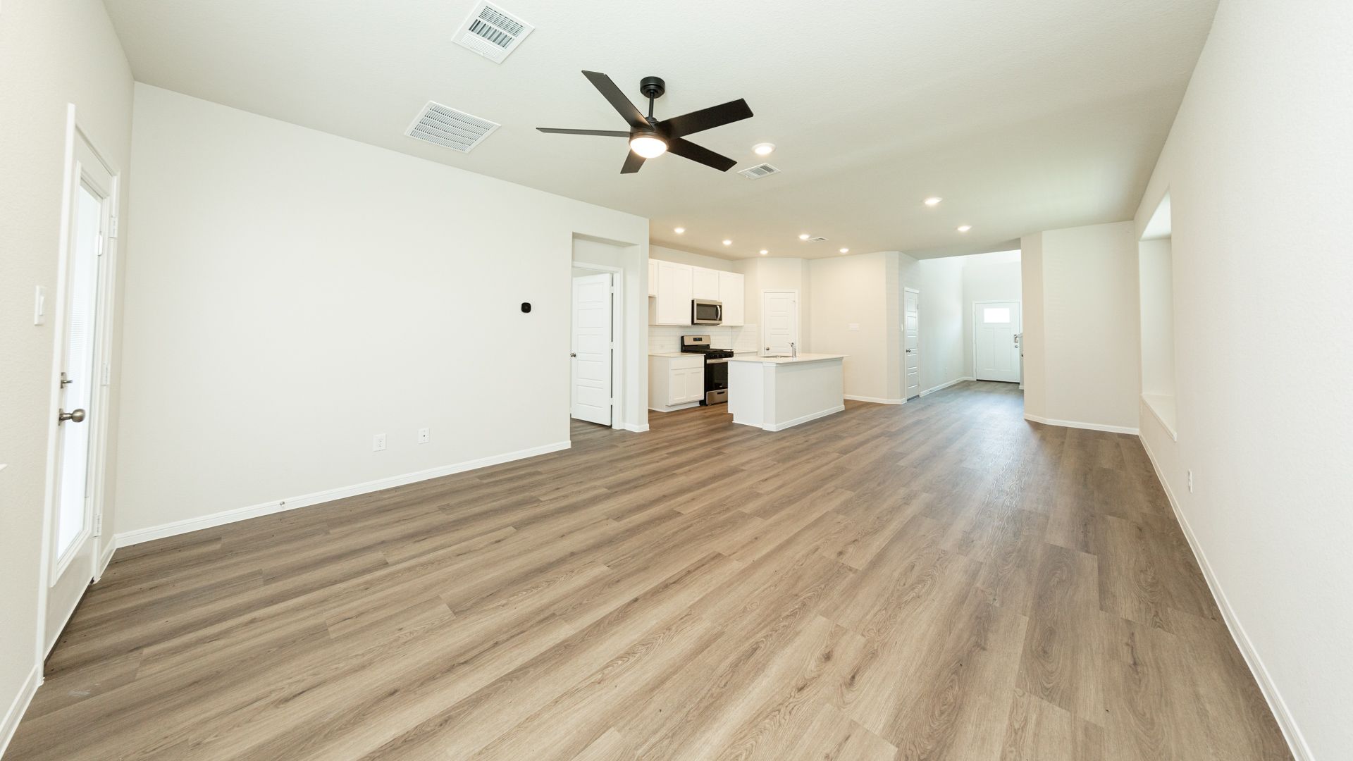 Family Room to Dining Area and Kitchen