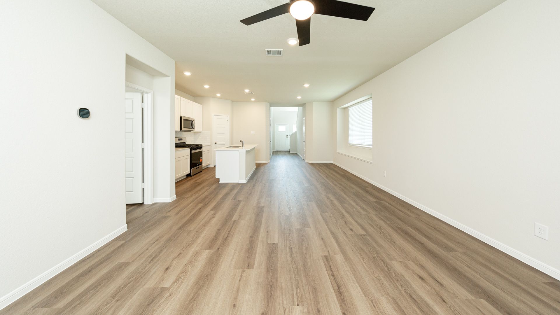 Family Room to Dining Area and Kitchen