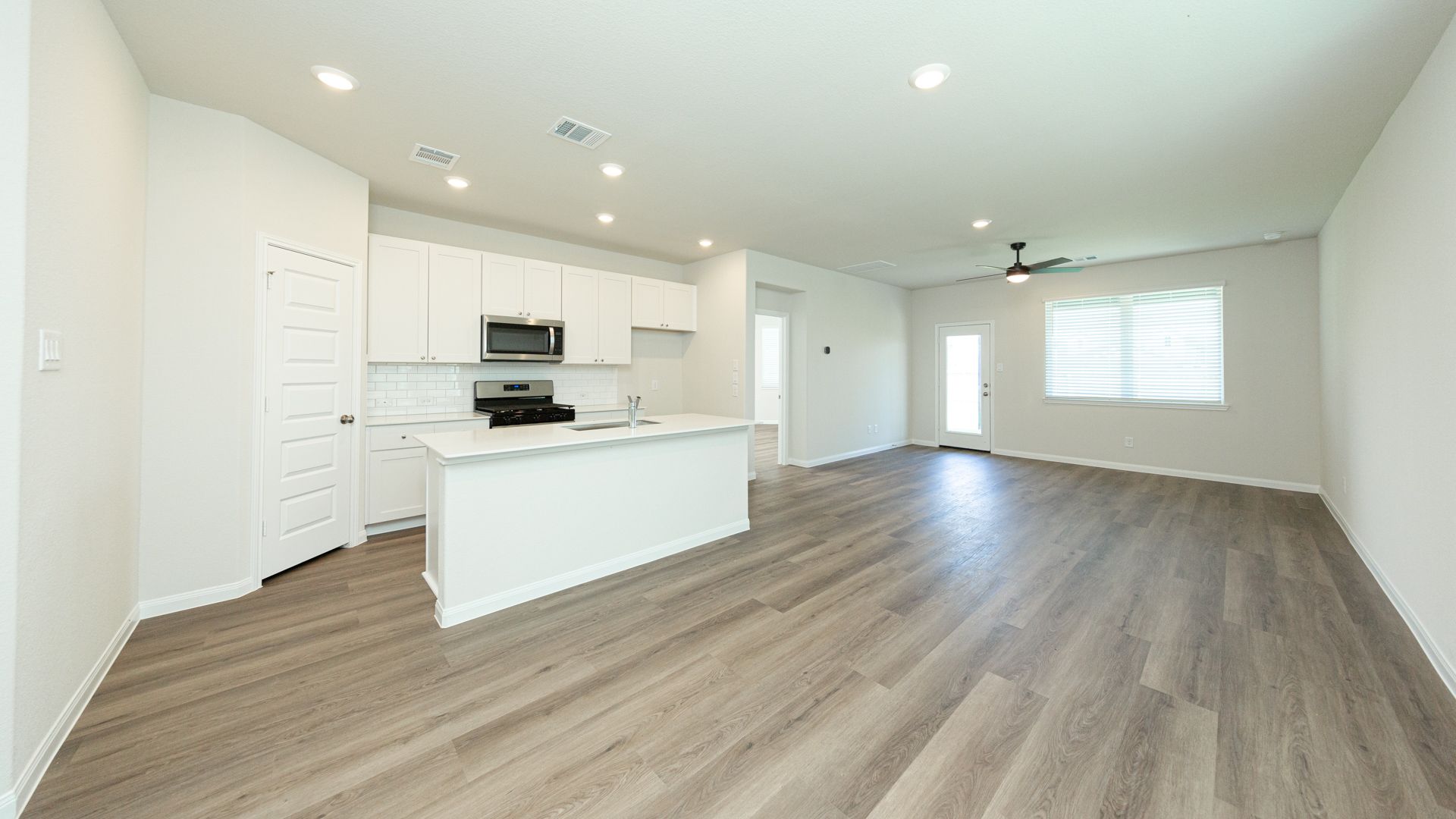 Dining Area to Kitchen and Family Room