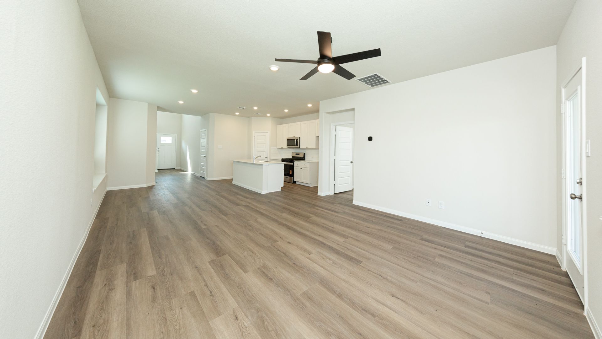 Family Room to Dining Area and Kitchen