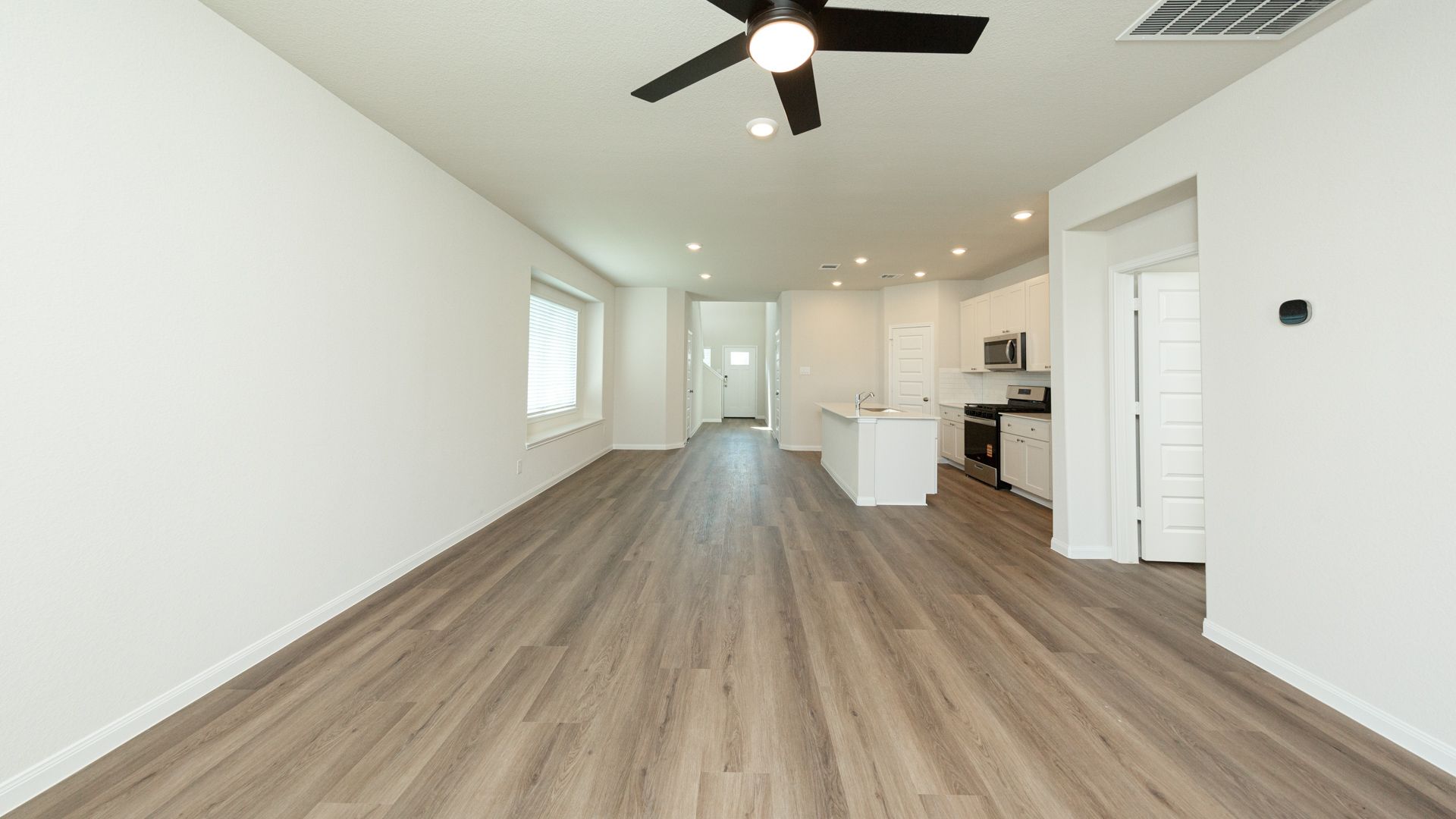 Family Room to Dining Area and Kitchen