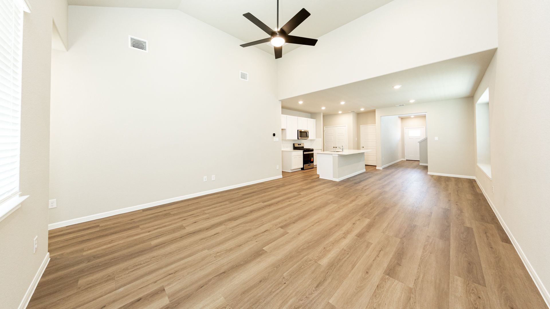Family Room to Kitchen and Dining Area