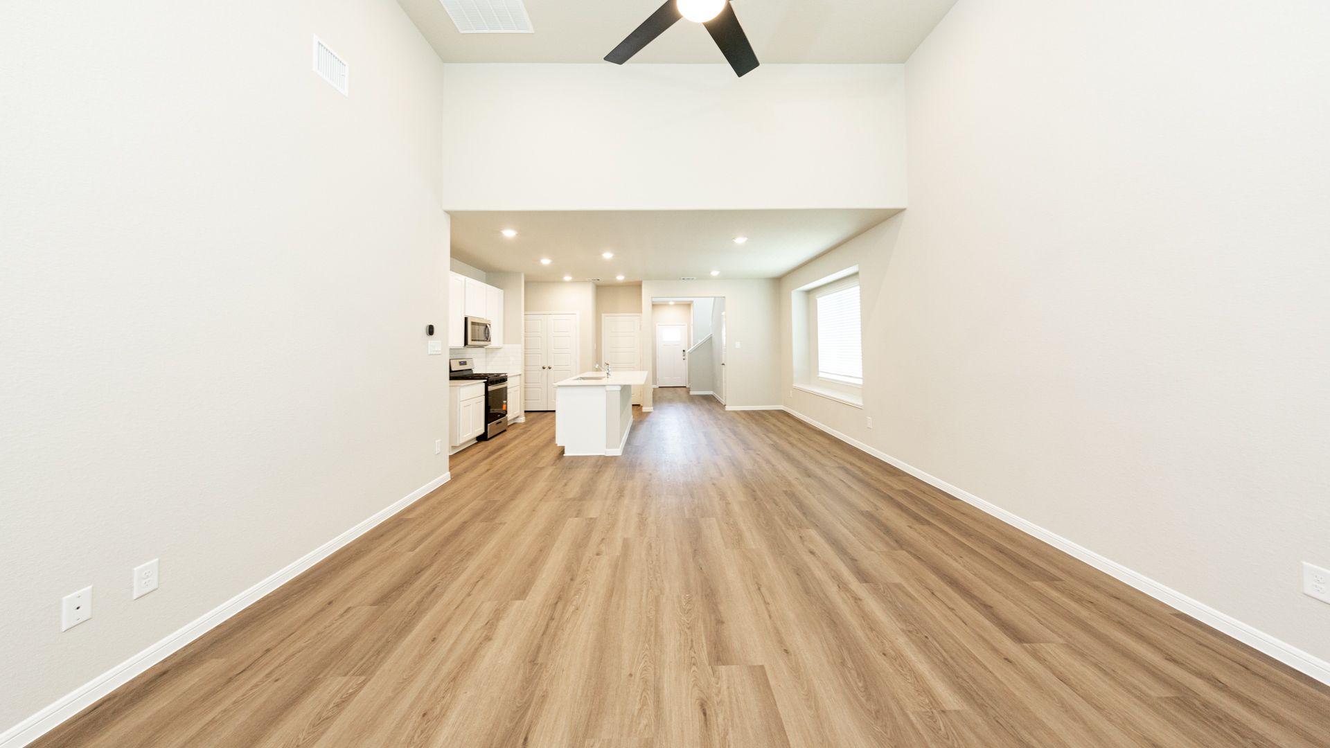 Family Room to Kitchen and Dining Area