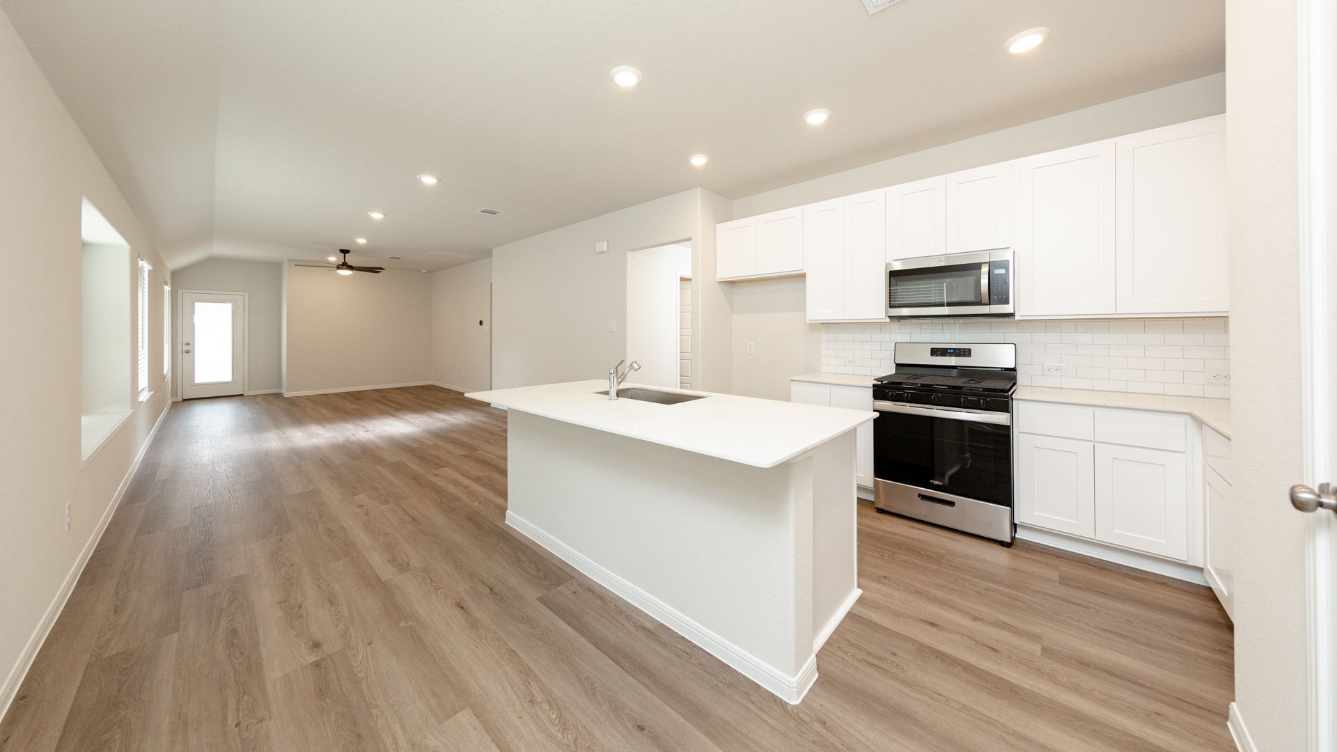 Kitchen to Dining Area and Family Room