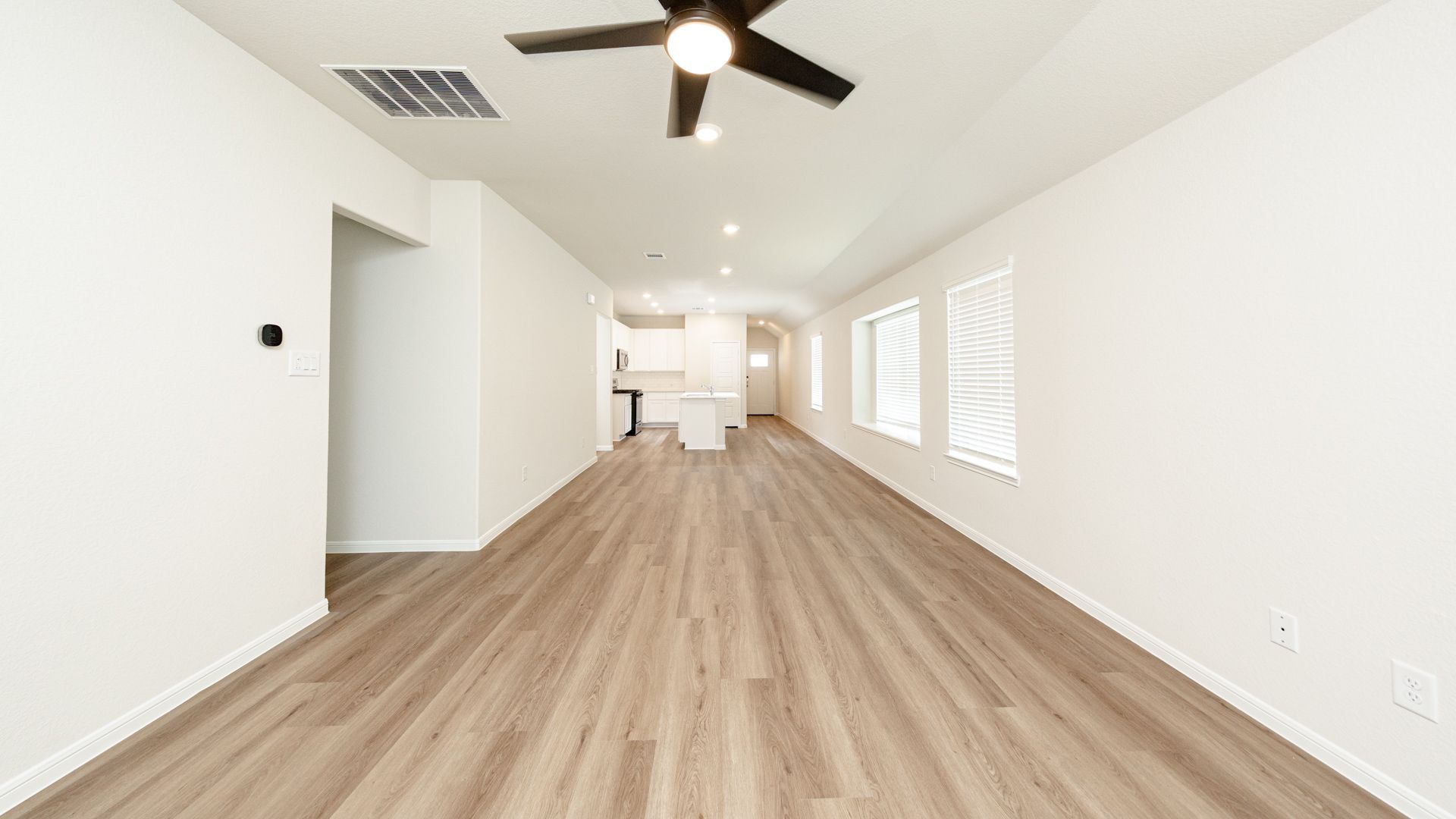 Family Room to Dining Area and Kitchen