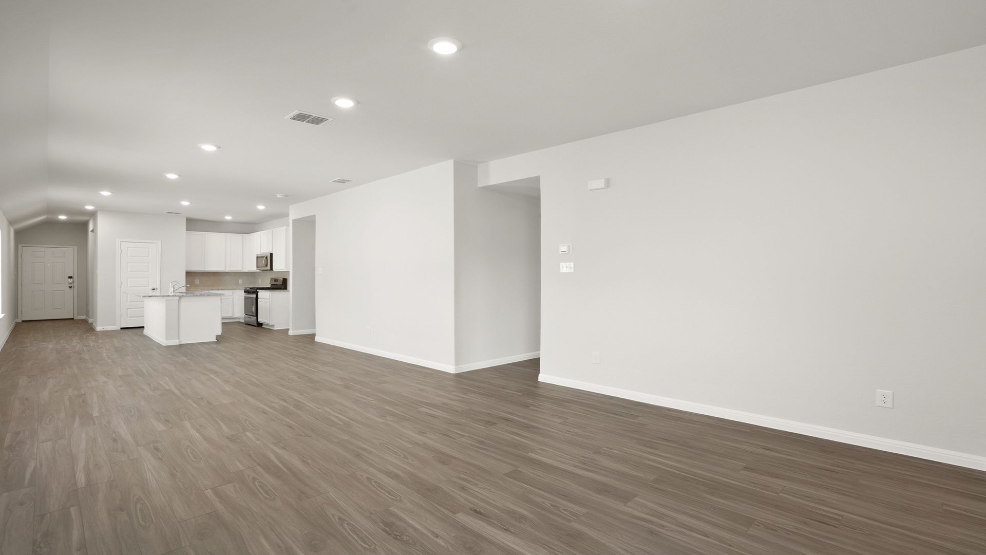 Family Room to Dining and Kitchen