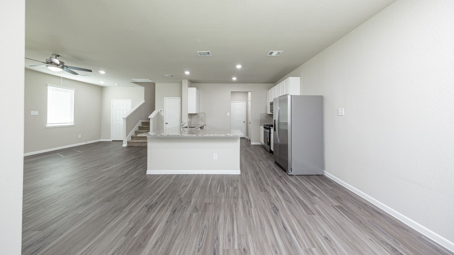 Dining Area to Kitchen and Family Room