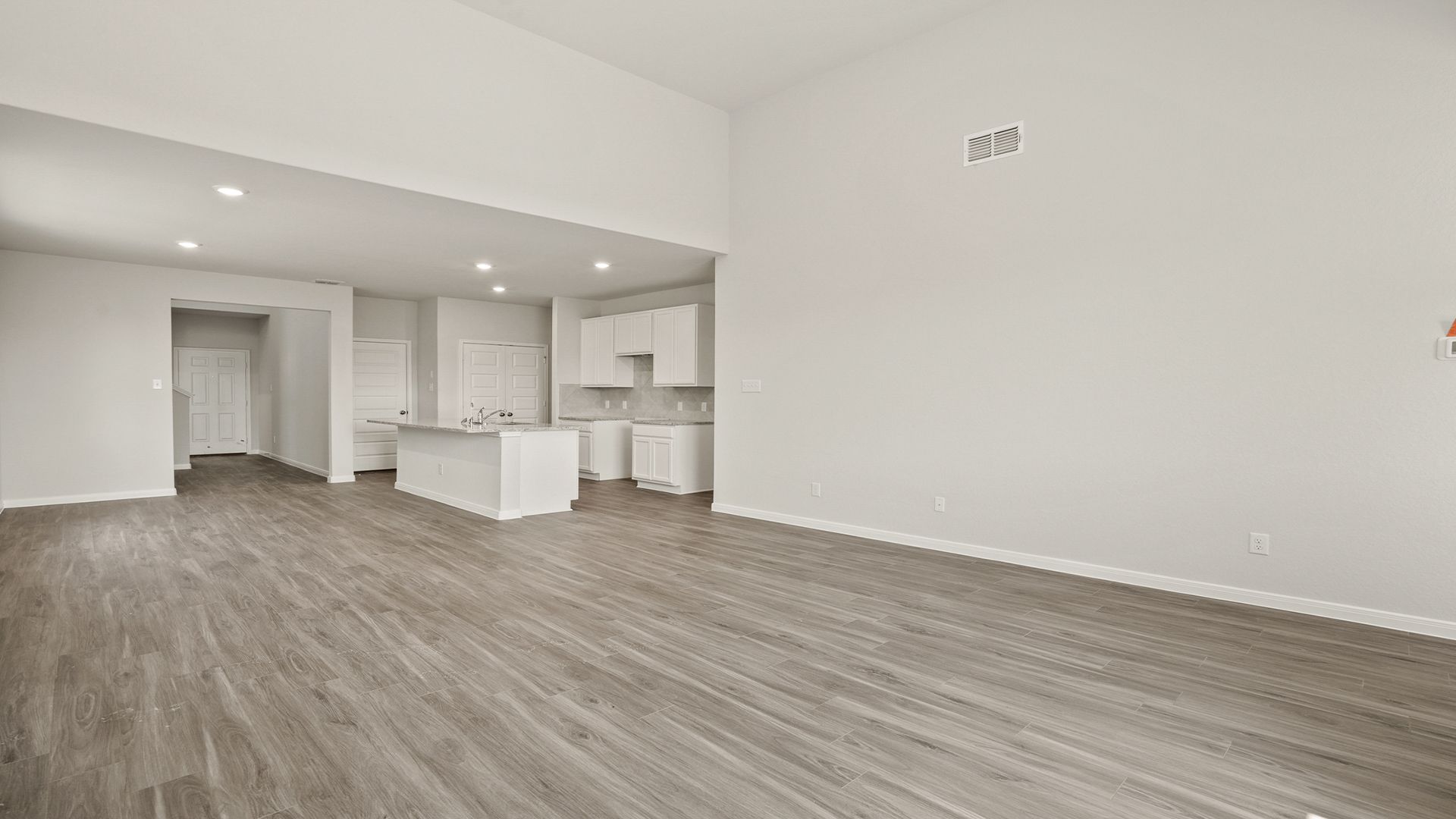 Family Room to Dining and Kitchen