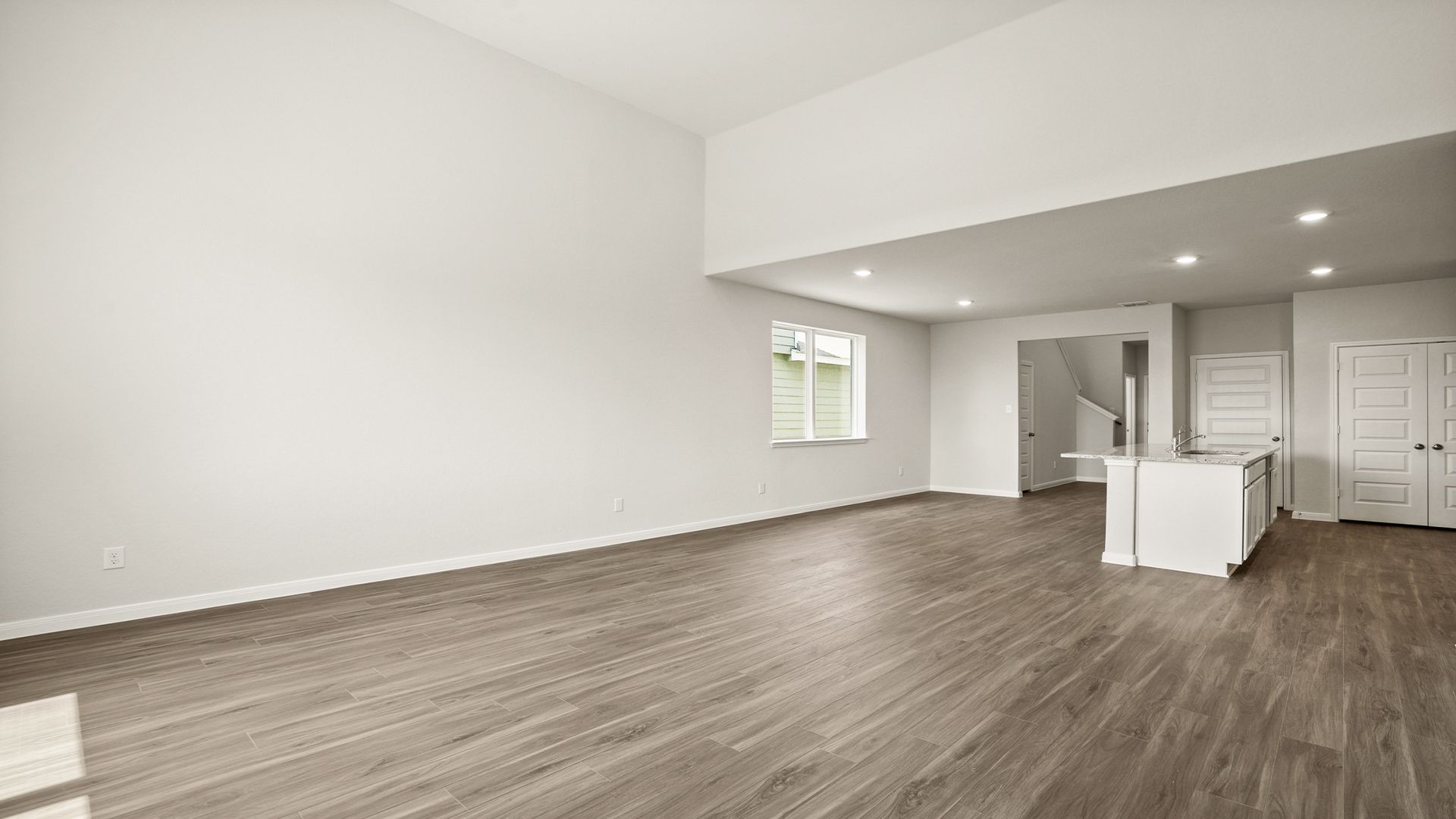 Family Room to Dining and Kitchen