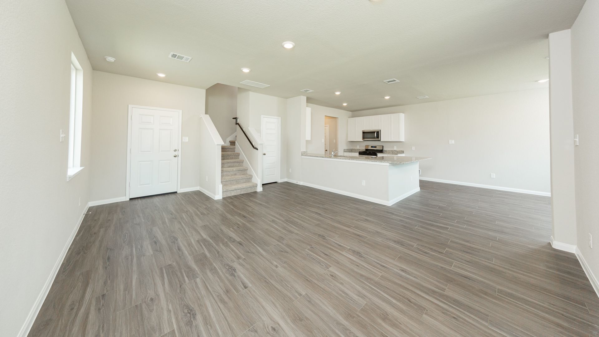 Family Room to Kitchen and Dining Area