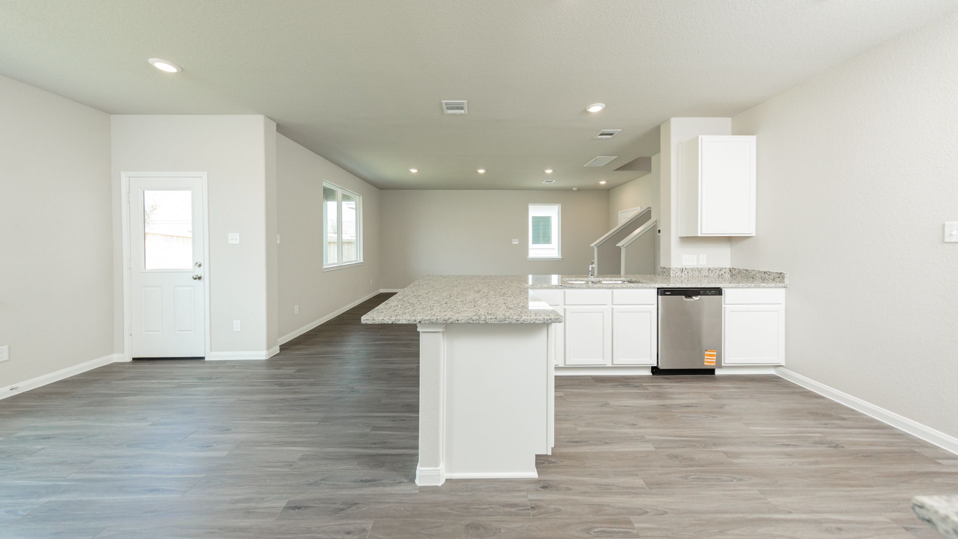 Kitchen and Dining Area to Family Room