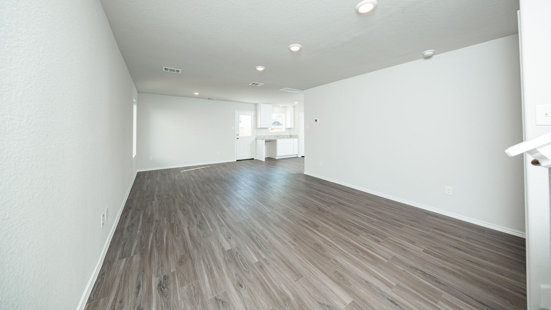 Family Room to Dining Area and Kitchen