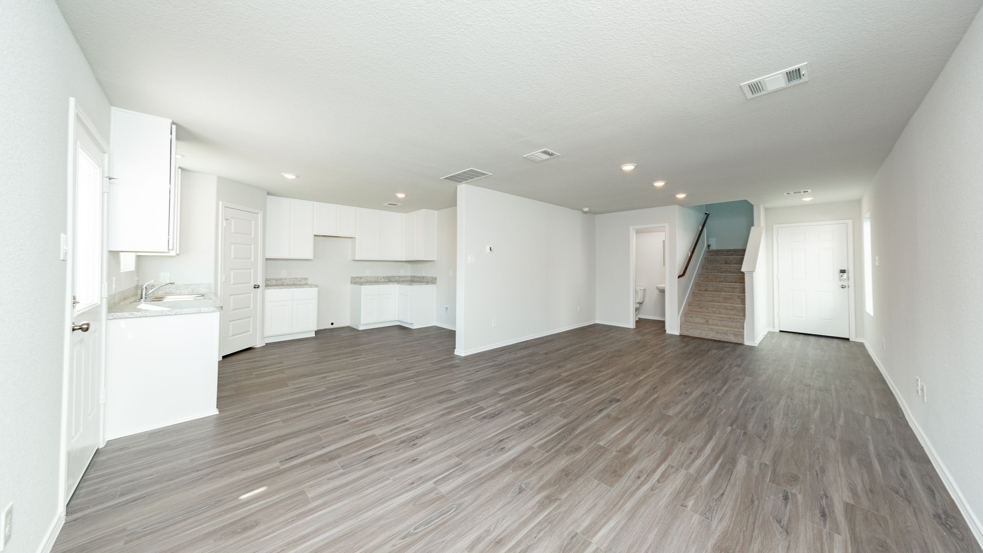 Dining Area to Kitchen and Family Room