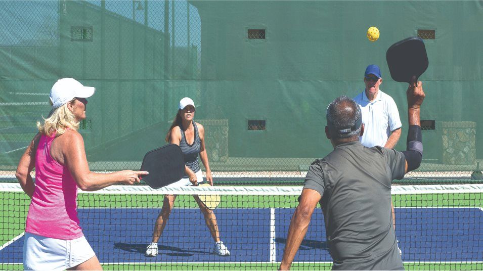 Friends playing pickleball