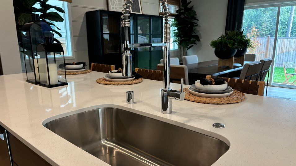 Stainless steel undermount sink with convenient pull-down spray