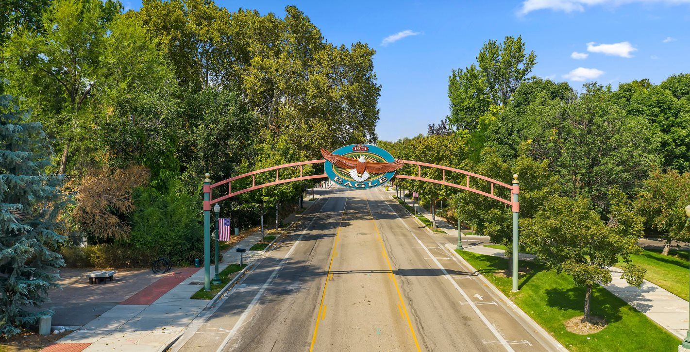 City monument assign on an arch above the street