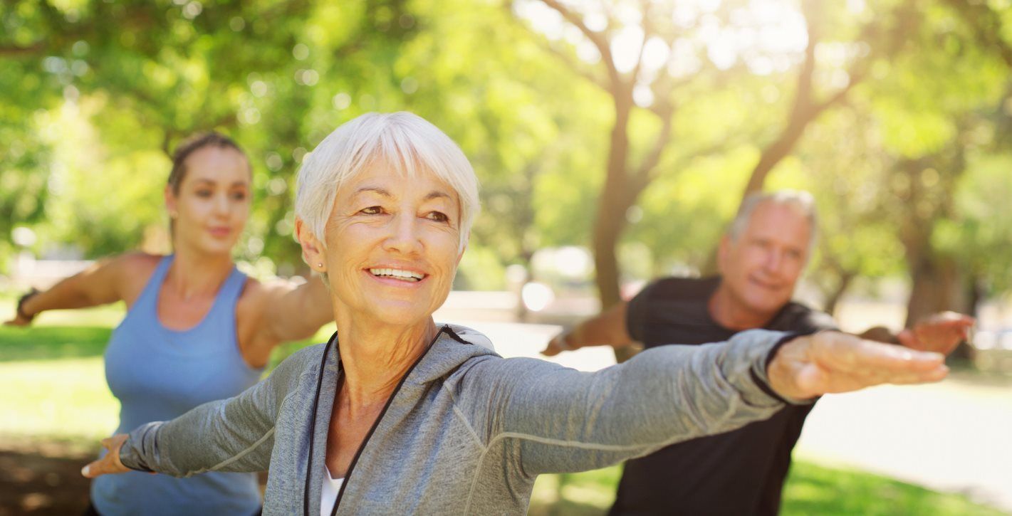 Woman practicing yoga in park