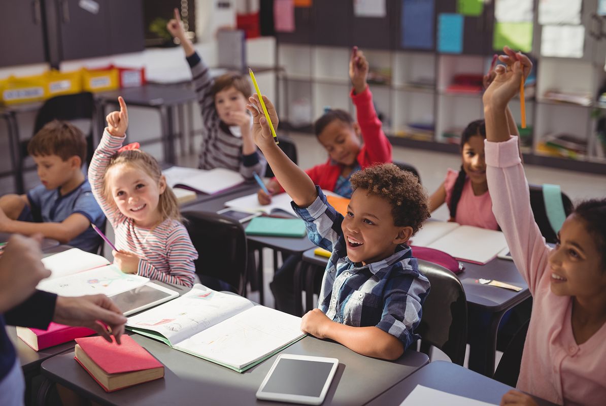 N Pic School Elementary Classroom Students Raising Hands