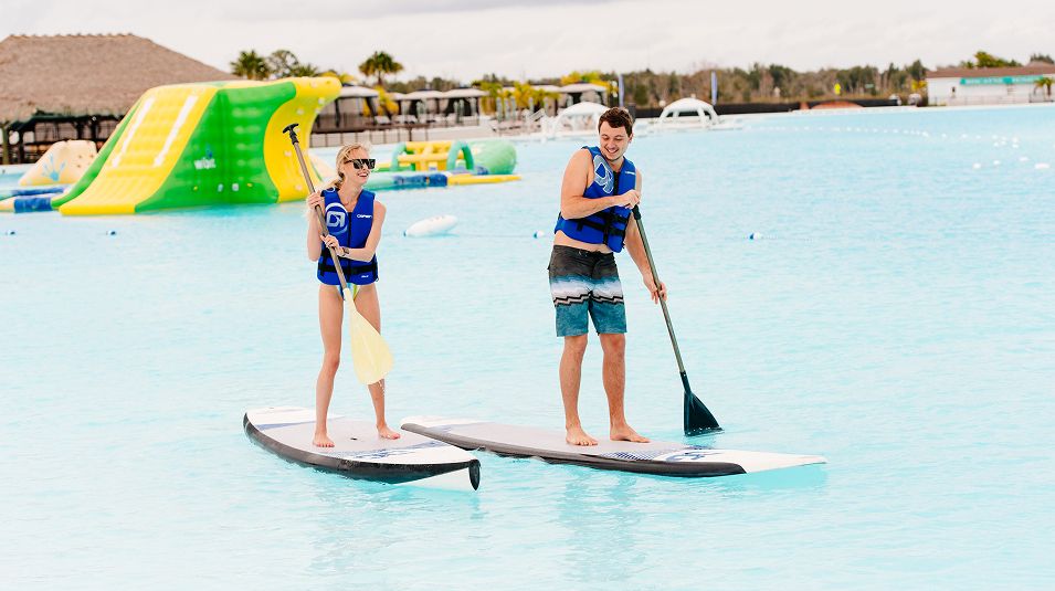 Florida Metro Dev Group Lifestyle Metro Lagoon SUP Couple Dev 10 24 25