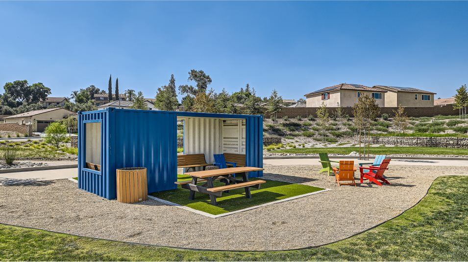 Shaded structures and seating at the River Ranch park