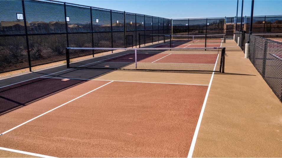 Tennis court fenced in