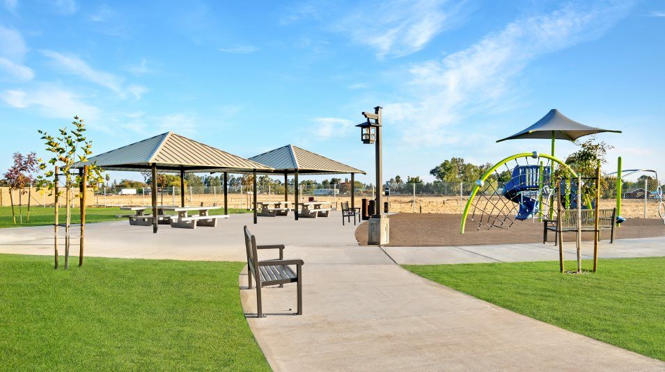 Park amenity with green space trail and playground