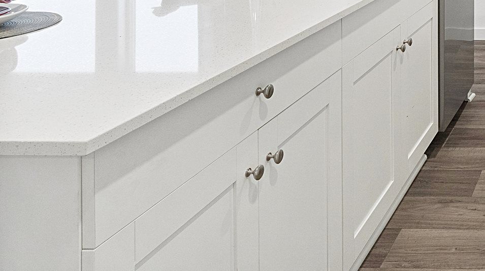 Cabinetry in White Linen in the kitchen for convenient storage space