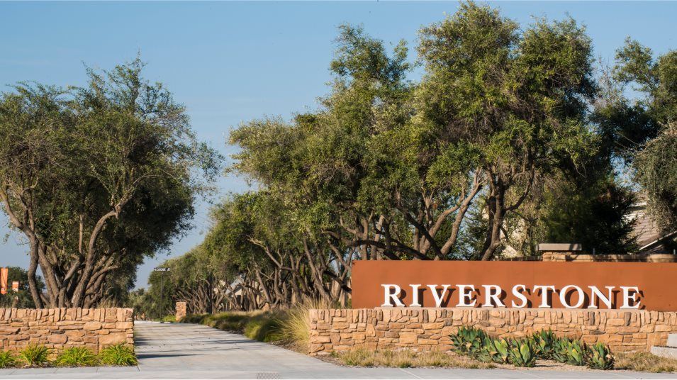 Trails amenity next to riverstone monument