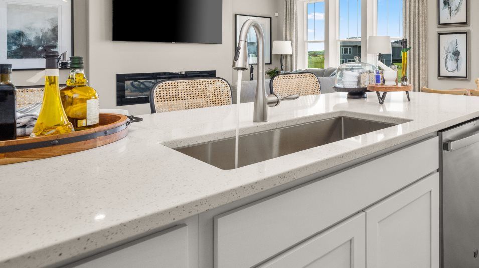 Undermount stainless steel sink with Moen® Spot Resist™ faucet