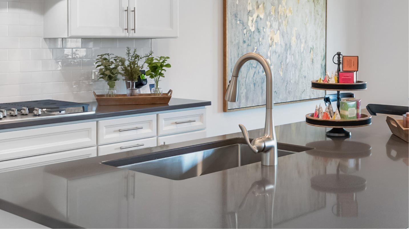 Undermount stainless steel kitchen sink with Moen® Spot Resist™ faucet