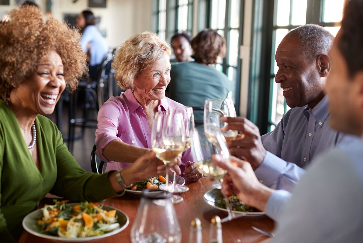 Pic Active Adult Couples Dining Toast