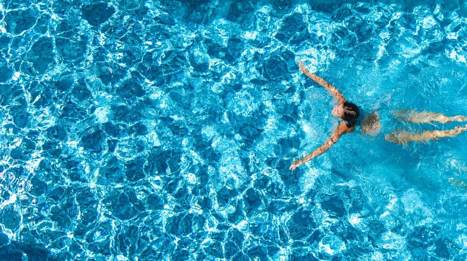 Woman Swimming in a pool