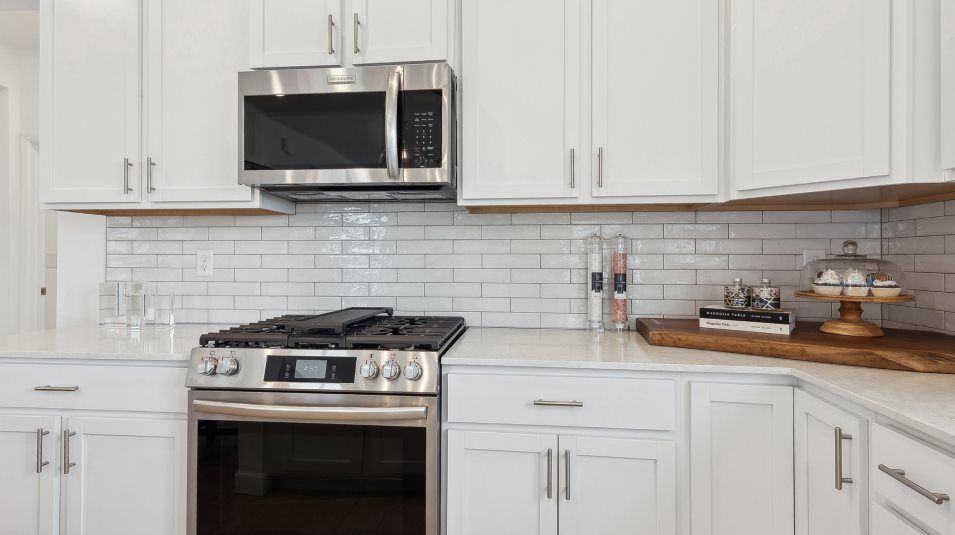 Stainless steel gas stove and over-the-range microwave oven