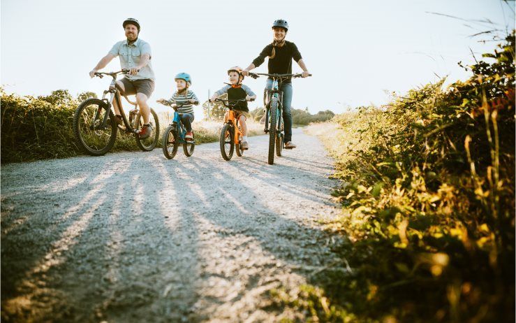 Go for a family bike ride along one of the trails in the community