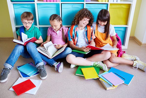 NC Pic School Elementary Library Students Sitting Reading Studying