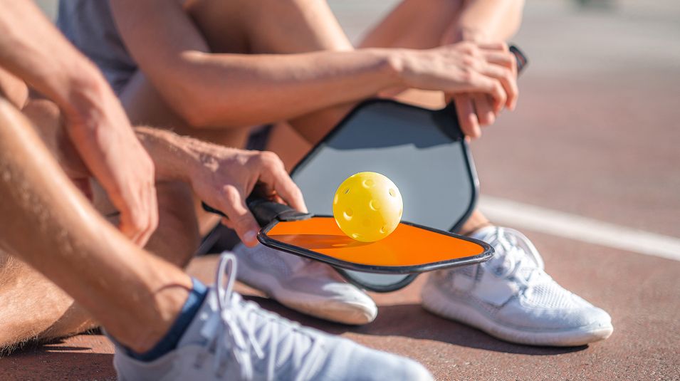 N Pic Sports Pickleball Couple Sitting
