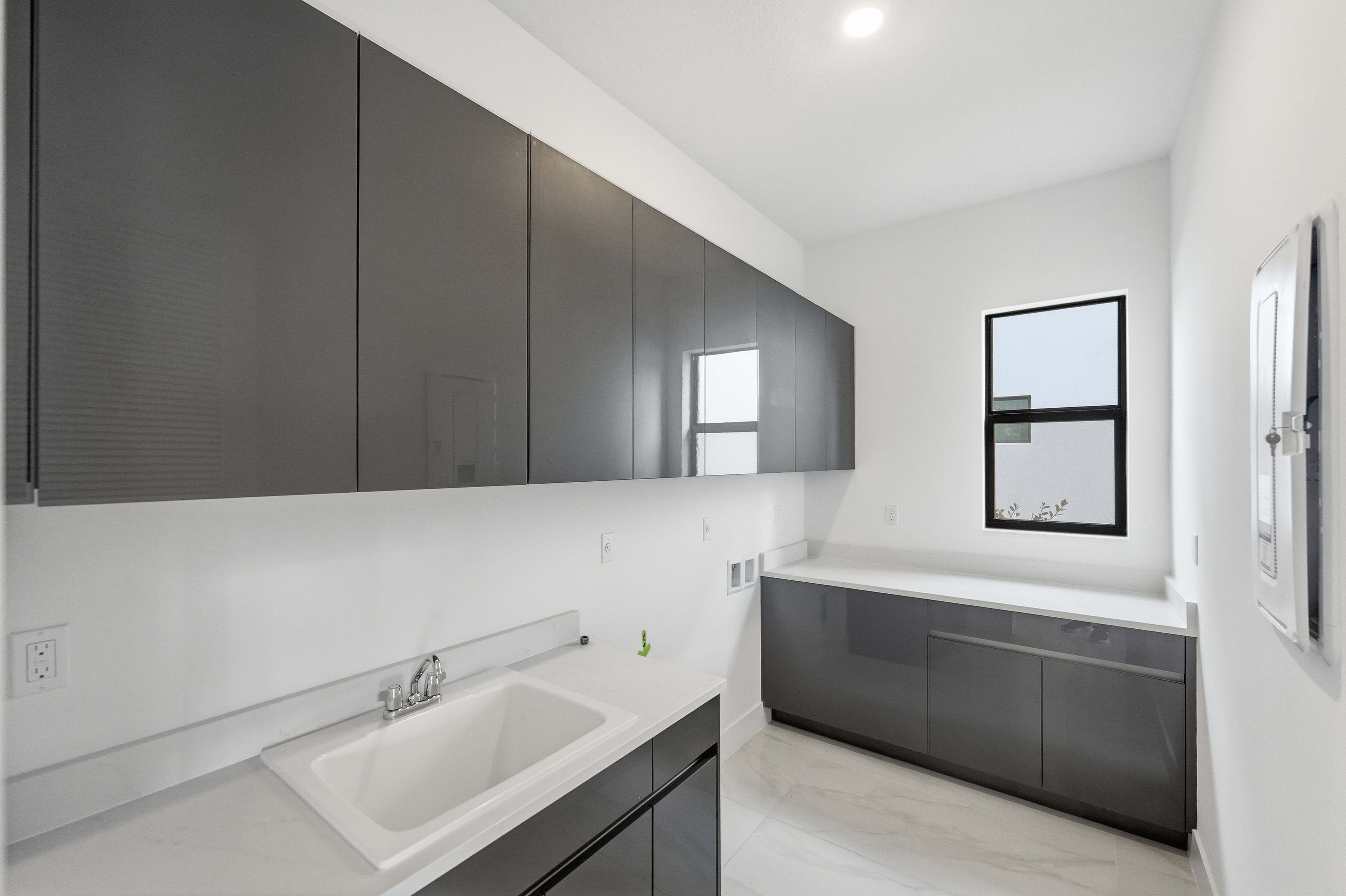 Whitmore Estates Versailles QMI H S124 Laundry Room F1
