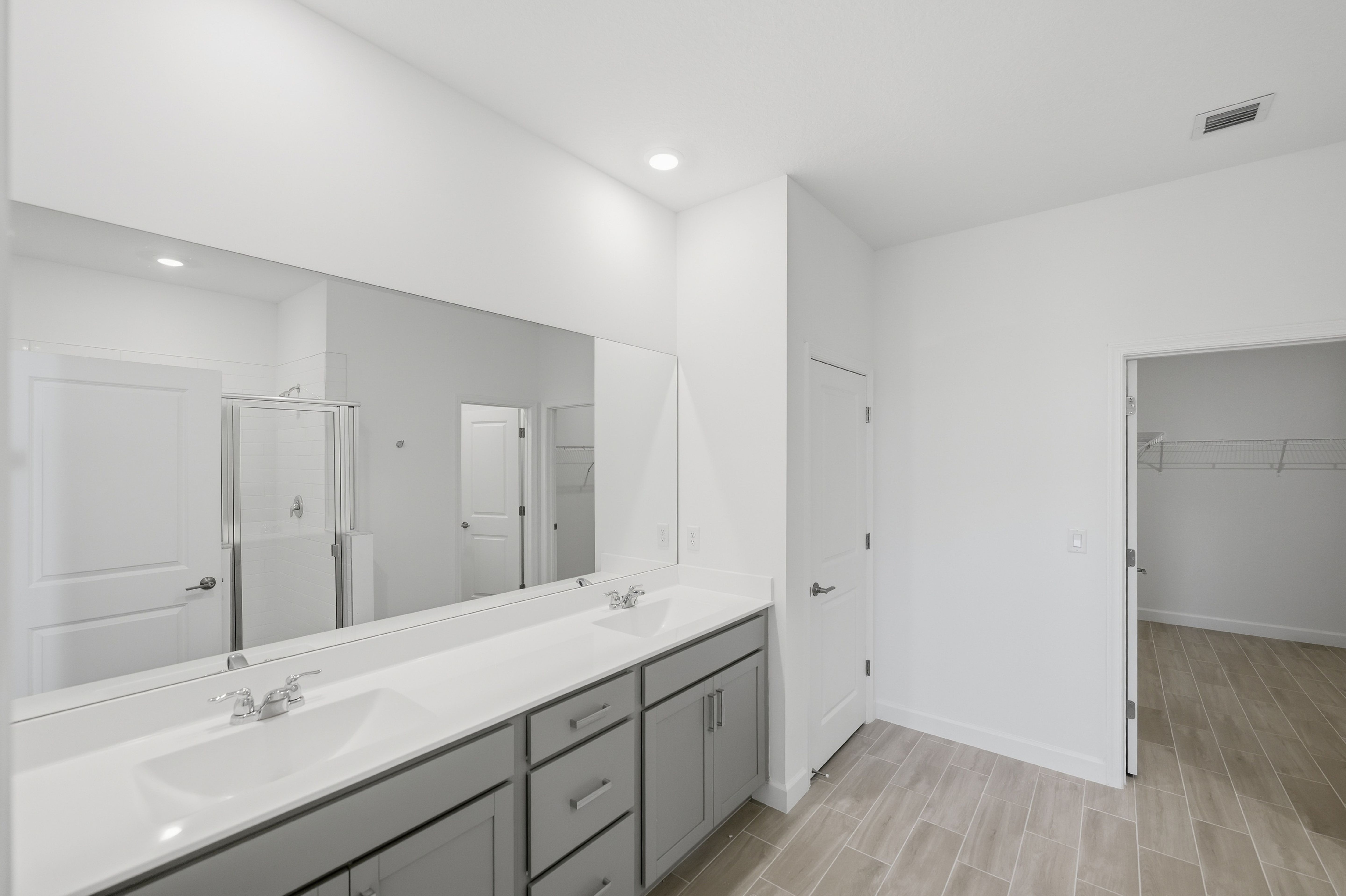 Twin Homes Glynlea Country Club Azalea QMI H S19 Owners Bath 2of3 F1