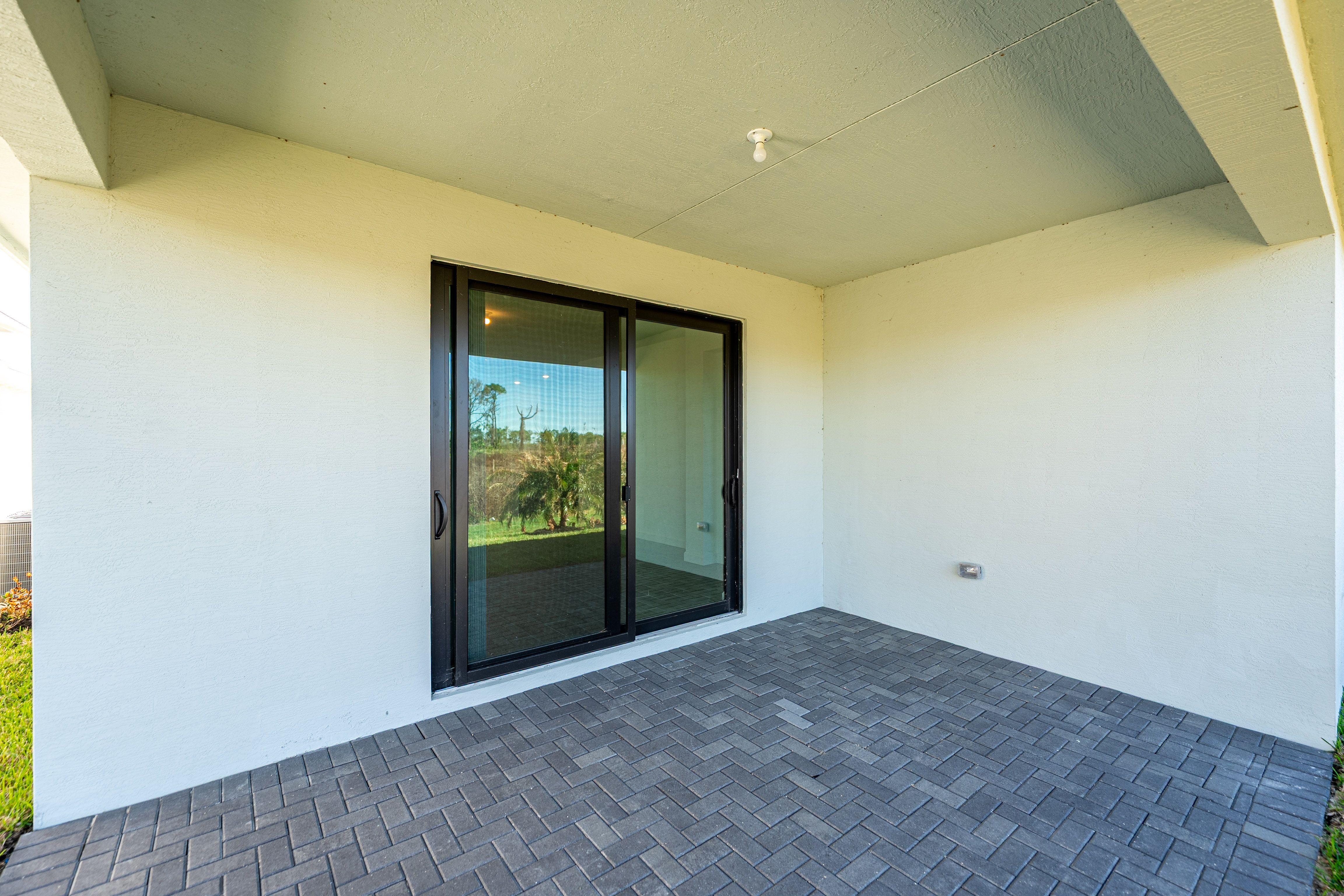 Twin Homes Glynlea Country Club Azalea QMI H S19 Lanai 2of2 F1