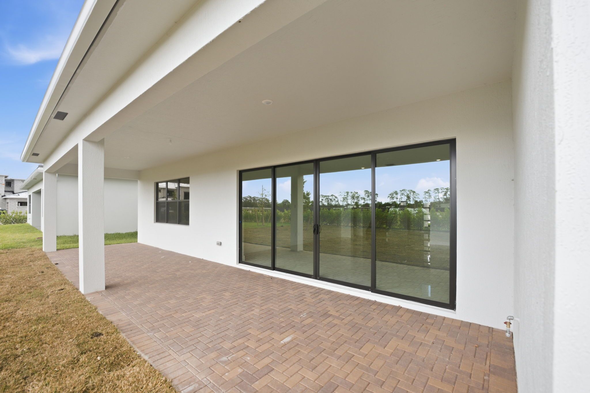 Whitmore Estates Versailles Lanai 2of2 F1