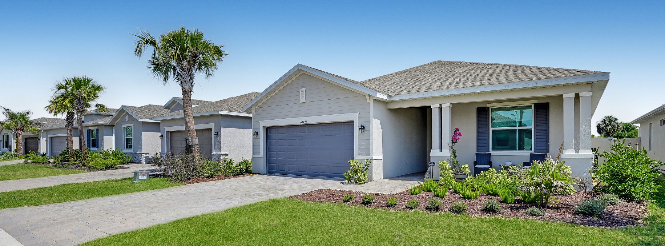 Executive Homes Brightwater Lagoon Streetscape 2of2