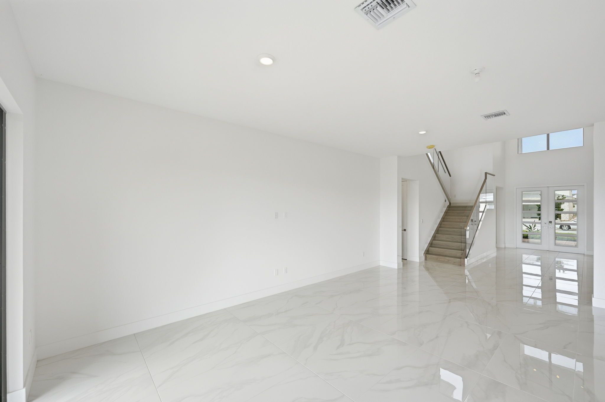 Whitmore Estates Versailles QMI H S123 Great Room 4of5 F1