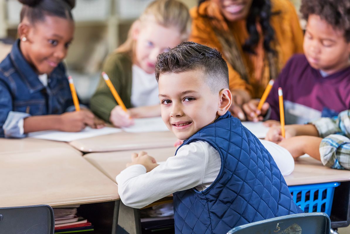 N Pic School Elementary Classroom Desks Boy Smiling