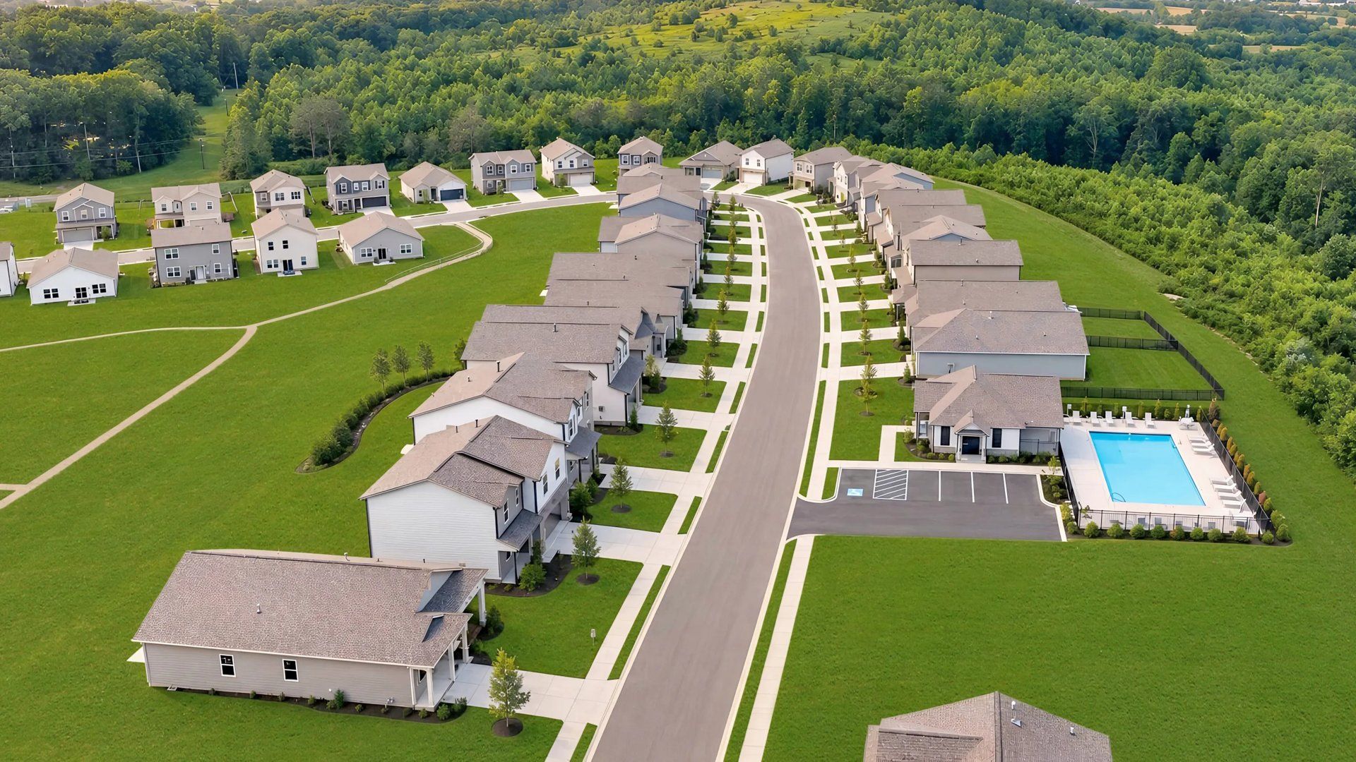 Aerial of neighborhood homes and pool